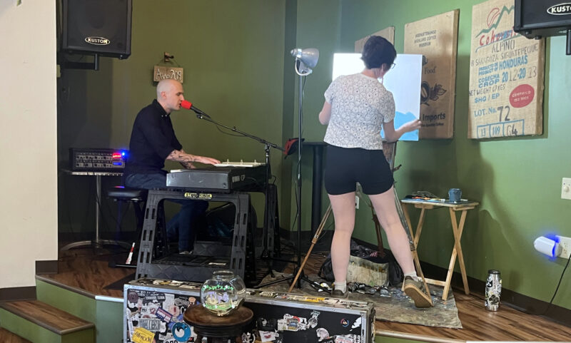 Pocket Vinyl performs for crowd at Avenue 209 Coffeehouse